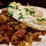 Picture of plated Keto Bacon Cauliflower Hash with a fried egg on top